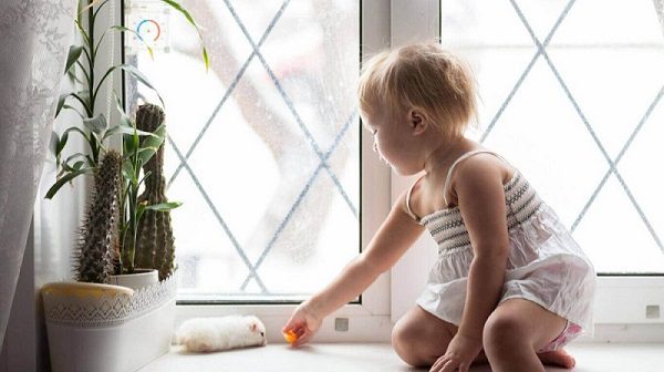 toddler-girl-play-window-with-hamster-real-interior-lifestyle-children-pets